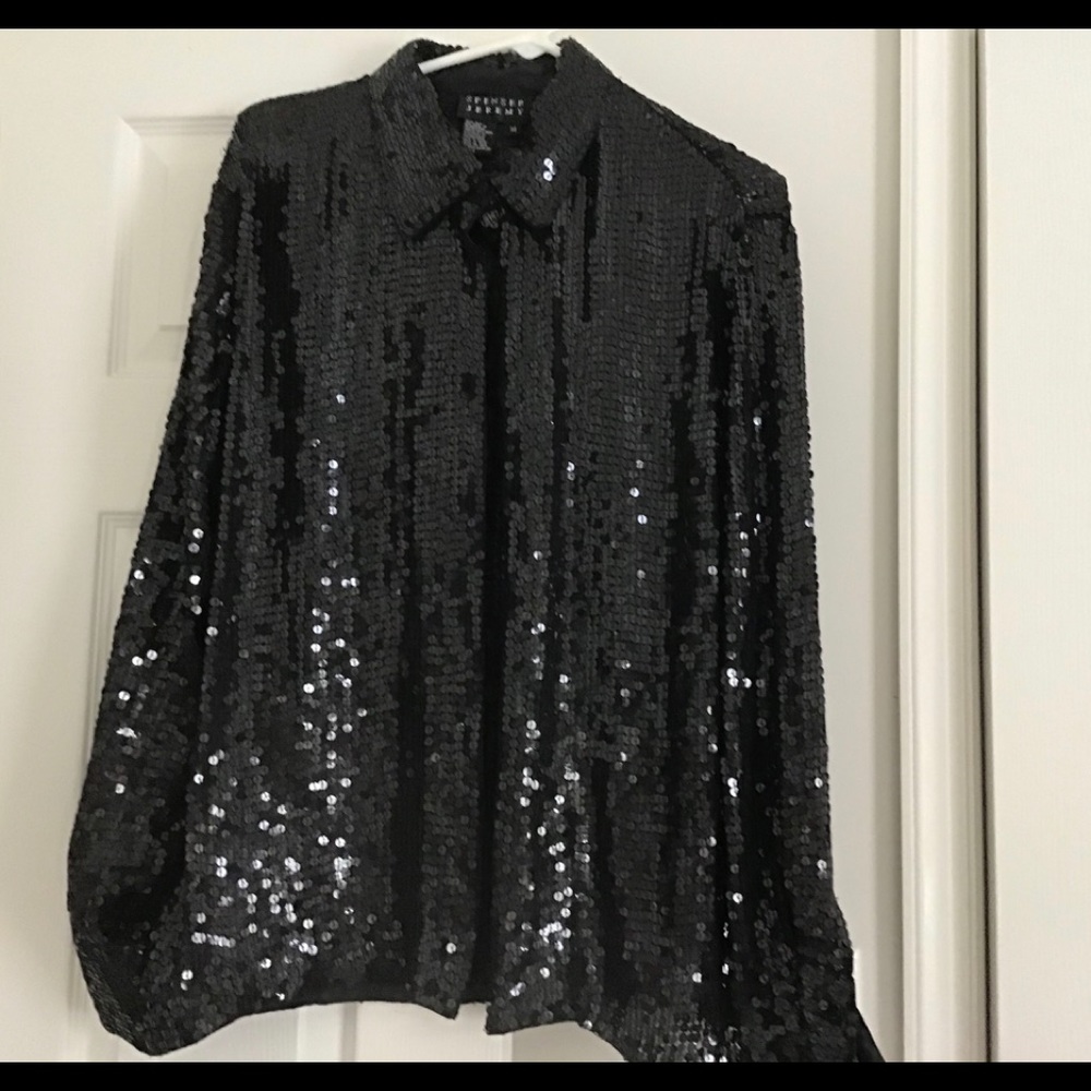 Elegant black sequined blouse